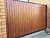 Откатные ворота из деревянного штакетника, тонированные в цвет 